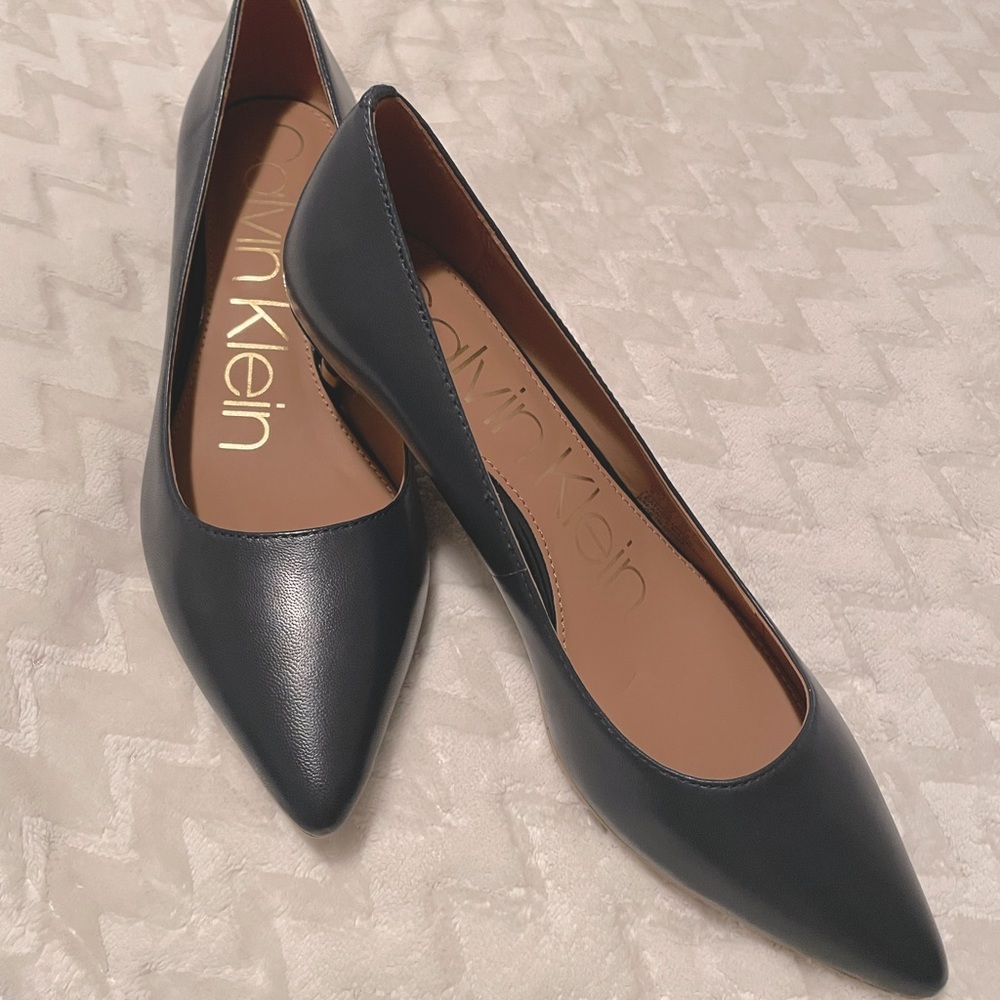 Brand new! Calvin Klein navy pumps